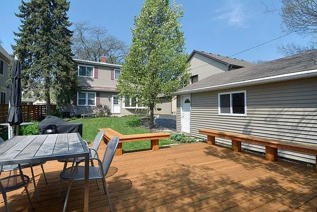 back of the house with patio and yard