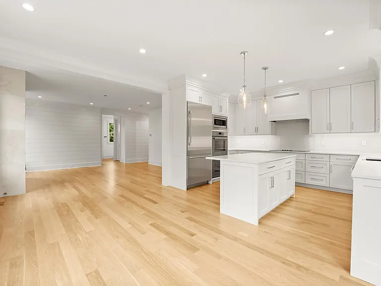 Kitchen Island Seats 4 - Opens up to Breakfast/ Dining Area - Leads to Glass Sliders Out to Private Patio and Large Yard