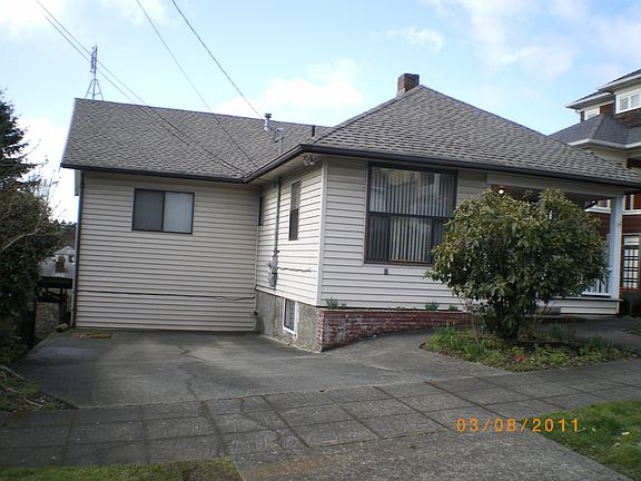 Front of house with carport