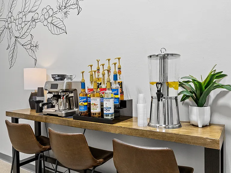 Breville-powered. Syrup-stacked. Eugene-served. This coffee bar (and Eugene) is the real MVP.