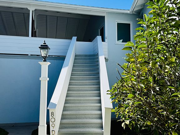 Private dedicated stairs leading up to the unit