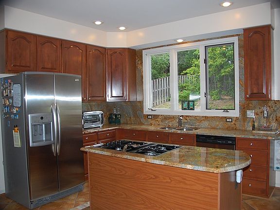 Remodeled kitchen with Jenn Air gas cooktop
