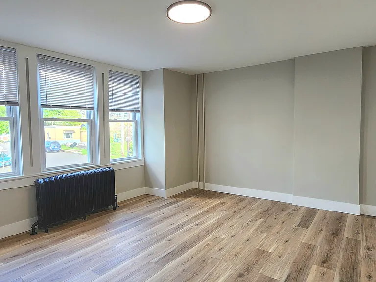 Main bedroom located at front of home. Angle 1.