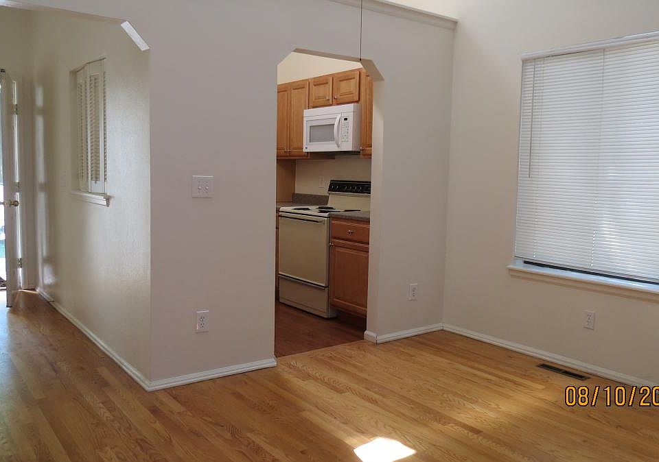 Dining and entry with hardwood floors