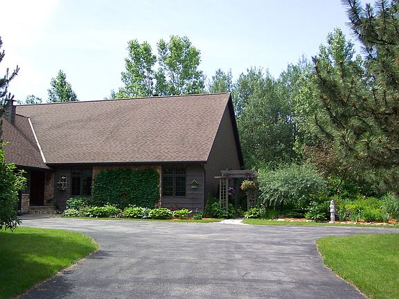 Large home hidden on 1.7 acres