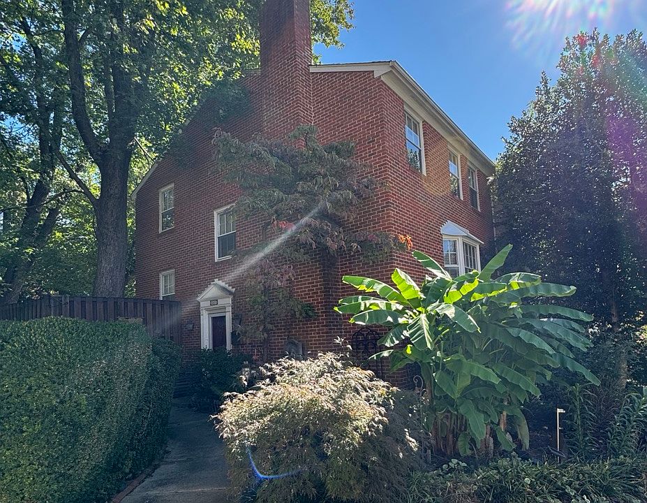Large end-unit colonial brick townhouse situated in a private cul-de-sac neighborhood.