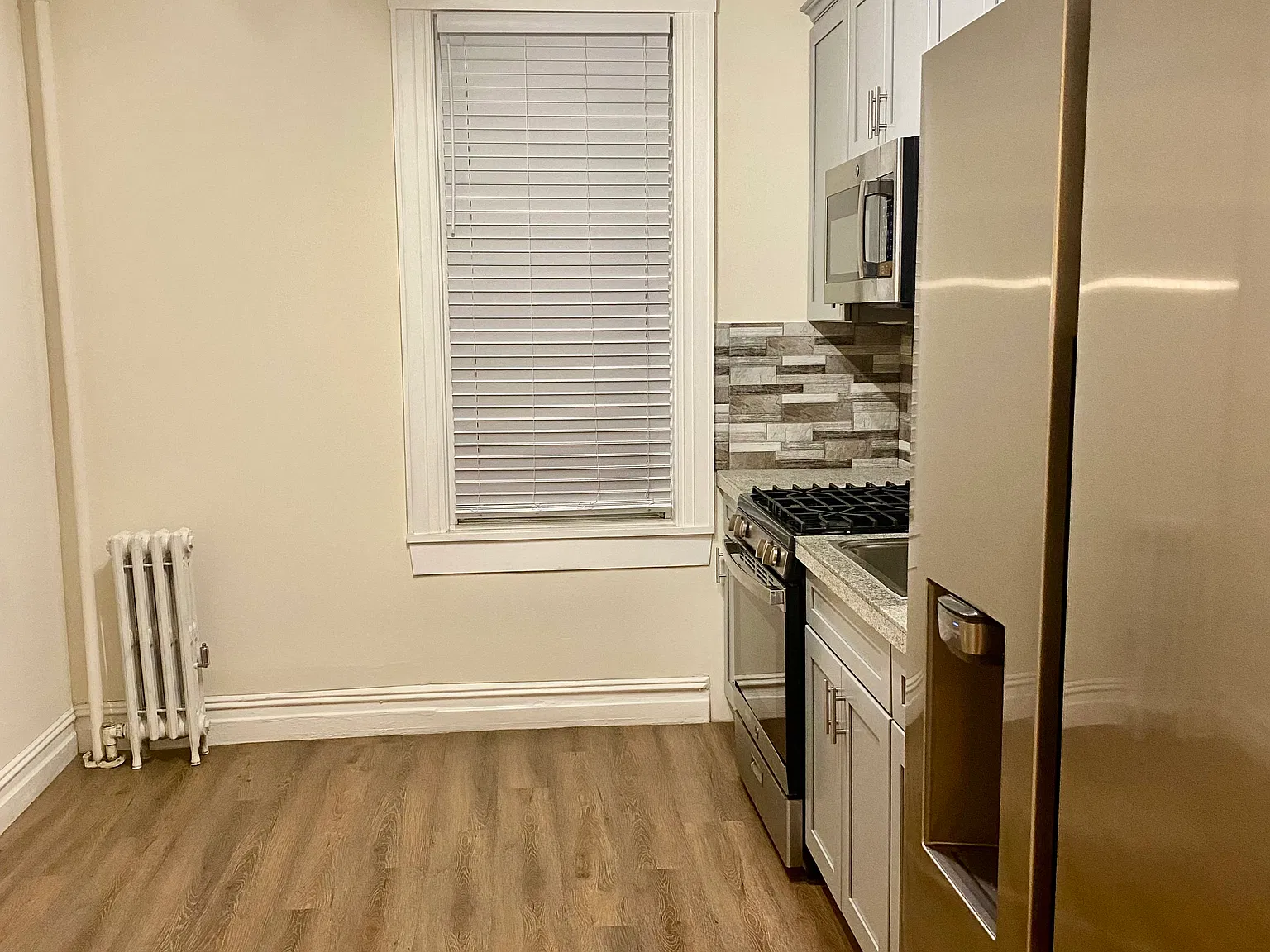 71st Pl, Ridgewood — Photo 1