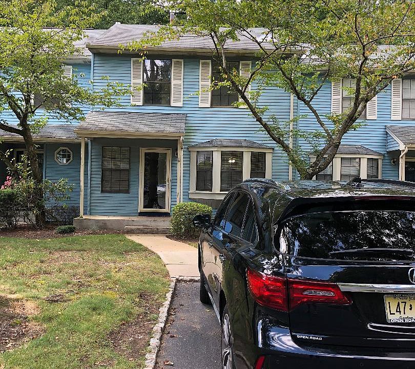 Front View, Parking in front of Townhouse and personal entrance/veranda