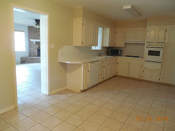 Kitchen with doorway to Den