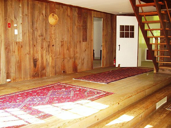 Dining Area showing Wide Board Floors 