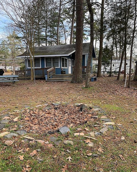 Yard view of home w firepit