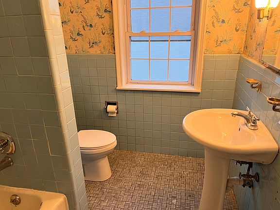Bathroom, new toilet, sink and faucet