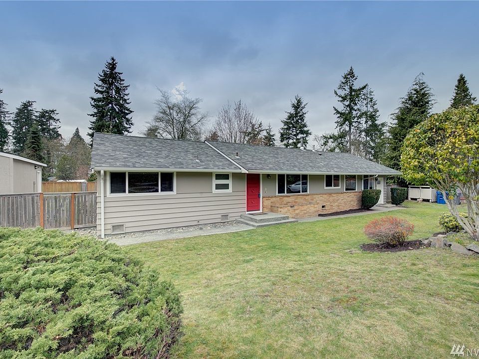 Welcome home! This charming Normandy Park rambler has incredible grounds!