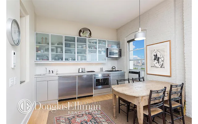 Sold by Douglas Elliman | media 18