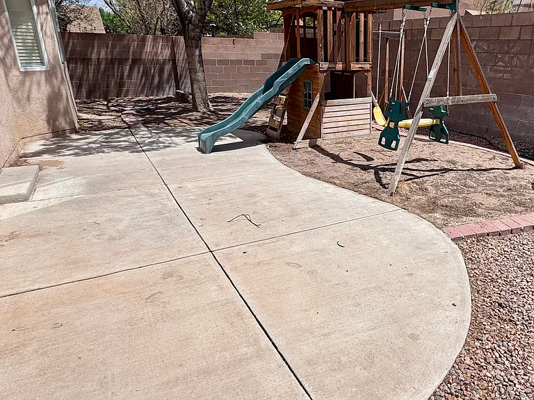 Backyard has working sprinkler system if new tenants would like grass