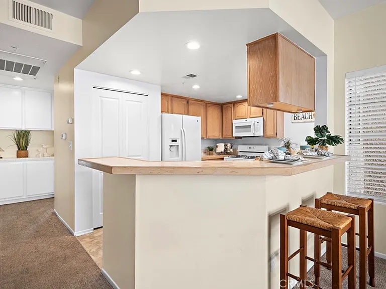 4581 Warner Ave #202 — Photo 10