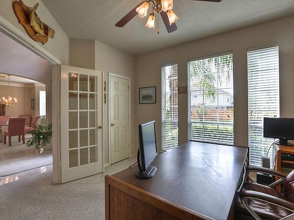 Study with French doors to the left of the entry hall