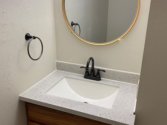 Hallway half bathroom.