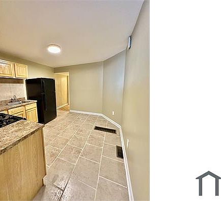 5th image of 7016 Woodland Ave #1