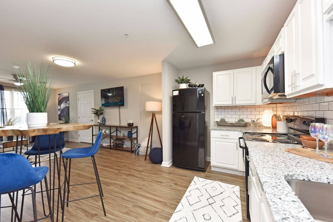 Kitchen with Backsplash + Modern Cabinetry