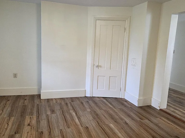 View From Living Room Into Kitchen Both With Premium Laminate Flooring