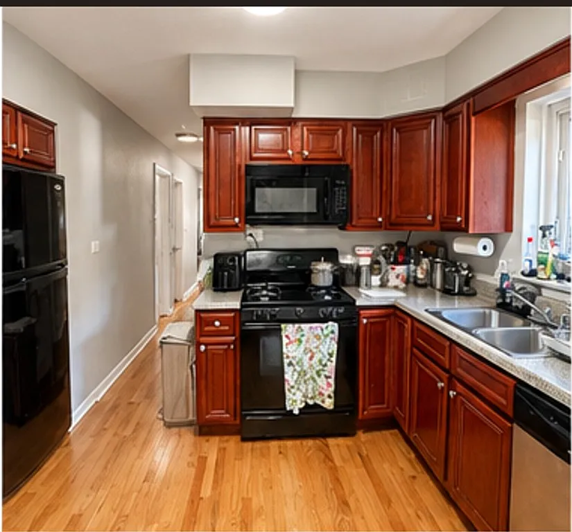 8613 Trumbull Ave — Photo 3