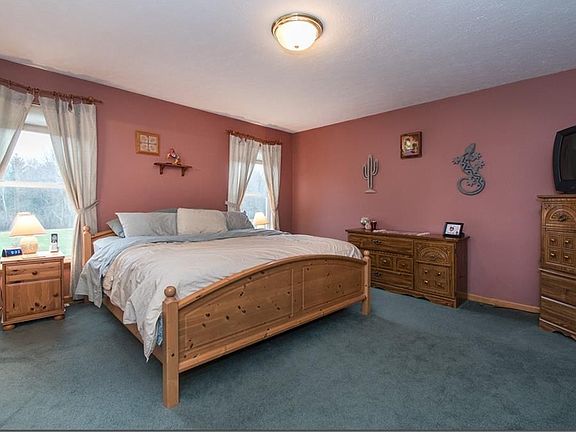 Master en-suite with excellent closet space...private bath with both a large soaking tub and stall s