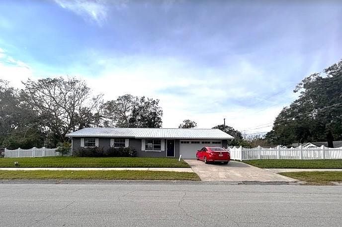 Ideal Family home, new: AC, Roof, Septic, electrical, pristine yard with banana, lemon, lime and fig trees