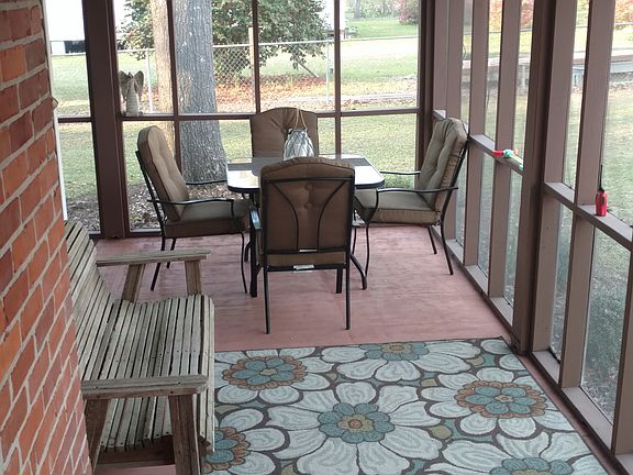 Wrap around screen porch