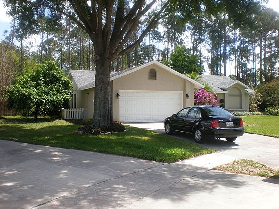 The front of the house - from the driveway of the neighbor on our left.