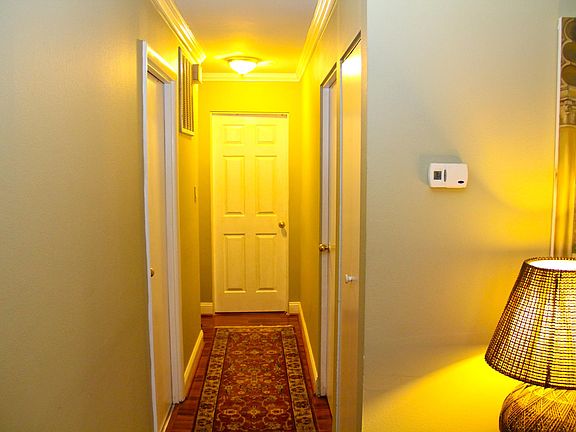 Hallway to three rooms - Room (3) Bedroom/Office, Room (4) Bedroom, and Room (5) Bedroom