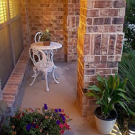 Front porch with patio set.