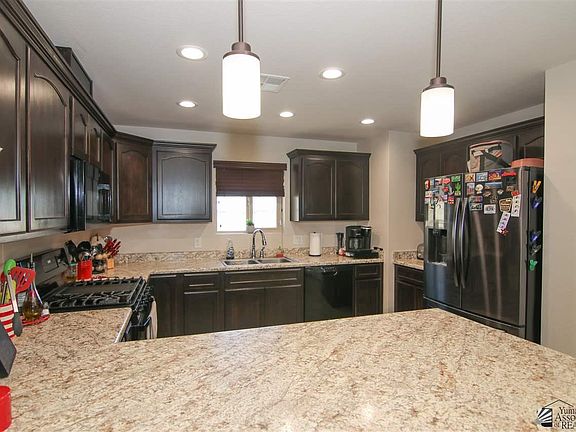 4th image of 10231 E 34th St
