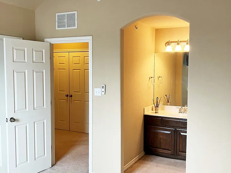 Vanity in the 3rd BR. Share a full bath.