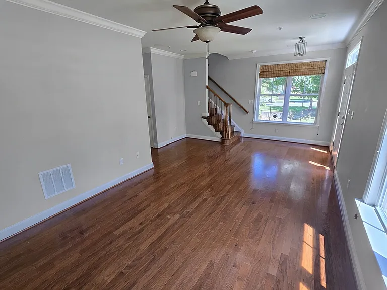 Spacious first floor with half bath and entrance to 2 car garage.