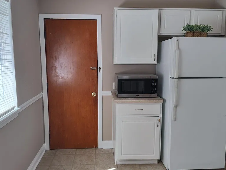Refrigerator, microwave included.