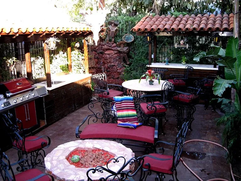 Common area BBQ, Fire Pit, bar, Fountain surrounded by Mariachis.