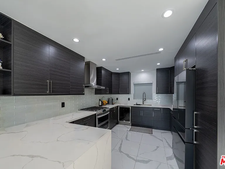 7719 Rhodes Ave — Photo 4