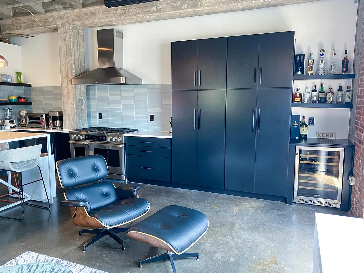 Large pantry with sliding shelves and bar with dual zone wine cooler. - 1819 Baltimore Ave #208