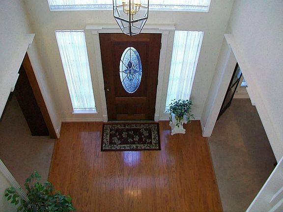 TWO STORY HARDWOOD FOYER