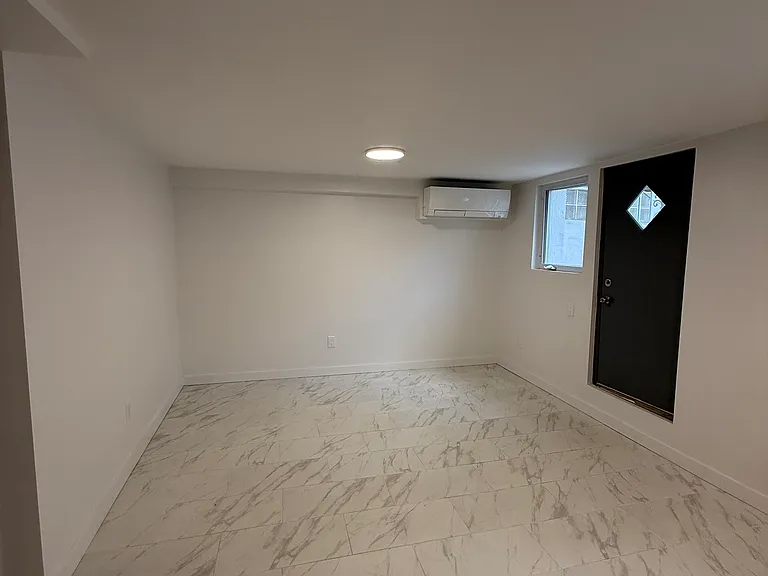 Living space can be used as a home office, guest room, or third sleeping area.