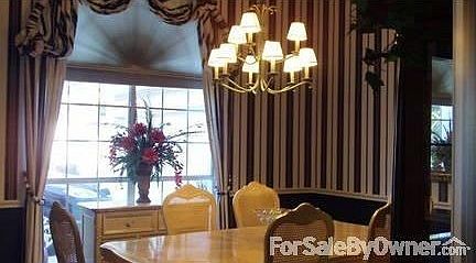 Dining Room
						:
						Beautiful/Elegant Dining Room. High ceilings and custom draperies.