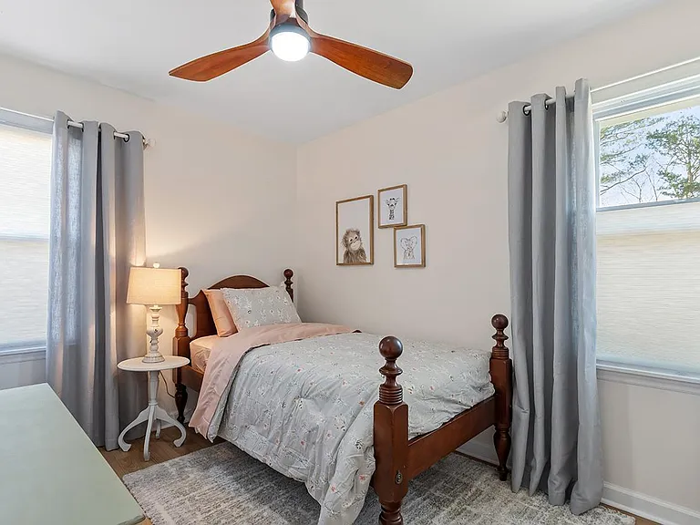 adorable antique wood twin bed.