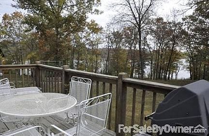 Back of House
						:
						Lake view. Meandering path down to lake. Gentle for swimming