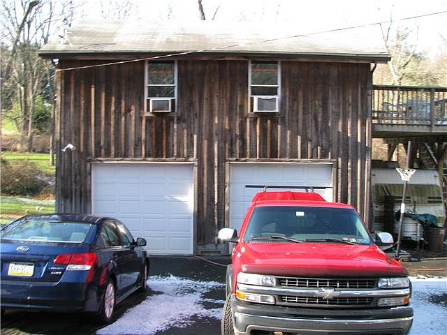 Garage, workshop, and upstairs Office