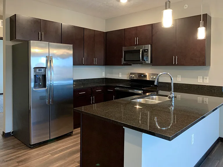 Our kitchens offer sleek finishes, stainless steel appliances, and ample counter space, making cooking and entertaining a breeze.