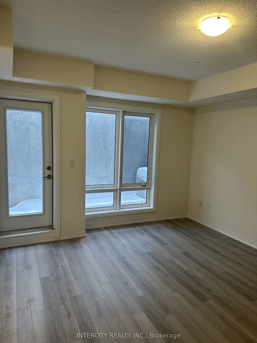 Photo 2 of 13 - 245 McLevin Ave #13 - Toronto, ON Building Photo - 245 McLevin Ave #13
