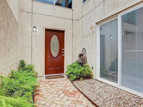 Gated front entry courtyard