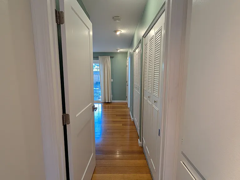 Bedroom hallway facing master bedroom.