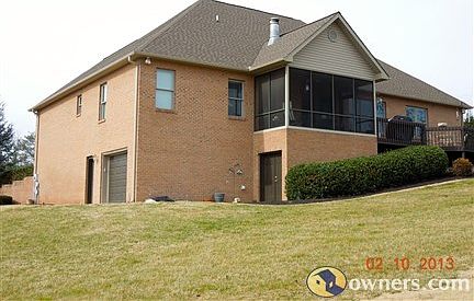 Garden equipment storage under screen porch